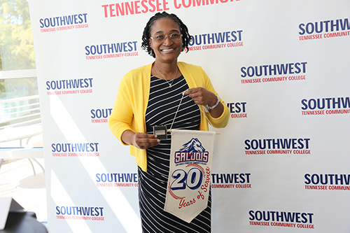 employee with flag showing years of service