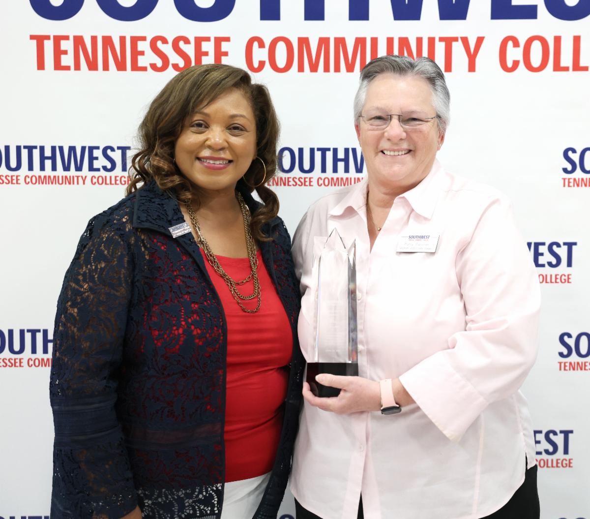 (L-R) President Tracy D. Hall presented the President's Awards to Patsy Fancher, interim associate dean for communications, graphics and fine arts.